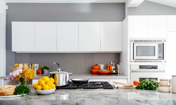 How to Design a Kitchen that Eliminates Food Waste with Smart Organizers?